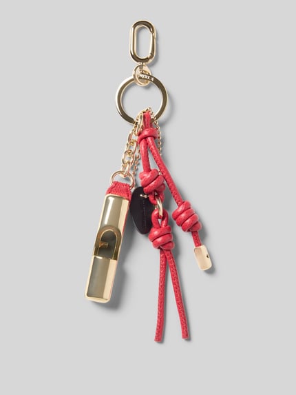 Produktfoto, goldfarbener und rosa Damen Anhänger mit Logo-Detail Modell 'IRIDE' von FURLA, Schlüsselring und Schnapphaken, strukturierte Oberfläche