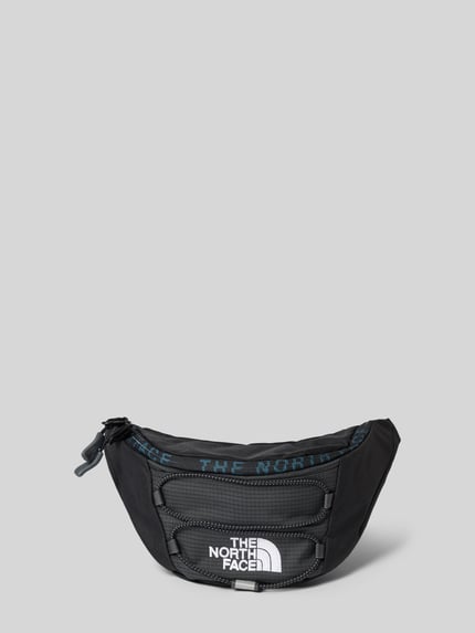 Produktfoto, czarna saszetka nerka Bauchtasche mit Logo-Print Modell 'Jester' od The North Face, główna przegroda z zamkiem błyskawicznym, regulowany pasek, logo, nadruk, szerokość w rozmiarze 1: 27 cm, długość: 16 cm, głębokość: 9 cm, długość paska: 30 cm