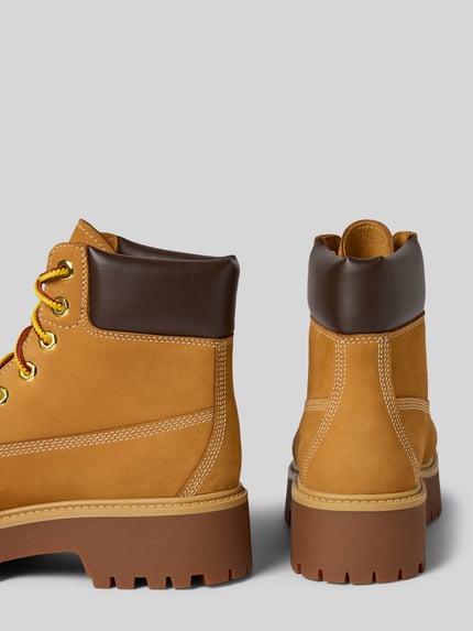 Productfoto, Schnürboots uit leermix van Timberland in camelbruin met profielzool, label in reliëf en waterdicht design, maat 39