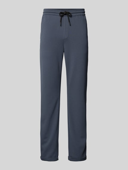 Produktfoto, Tapered Chino mit Viskose-Anteil von Tom Tailor Denim w kolorze jednolitym, długie nogawki, elastyczny pas z troczkiem, kieszenie z tyłu i boczne, stałe mankiety, lekko zwężany krój, tekstura gładka.