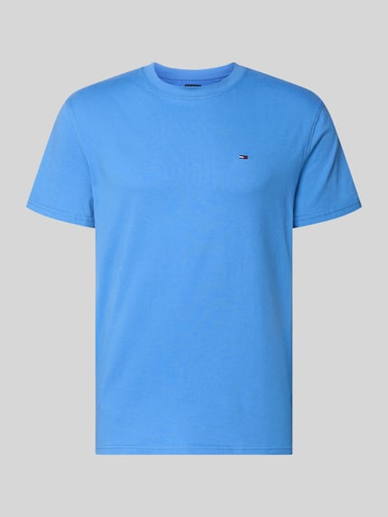 Produktfoto, Regular Fit T-Shirt aus reiner Baumwolle von Tommy Jeans in Unifarbe Blau mit Logo-Stitching, Rundhalsausschnitt, Jersey-Struktur.