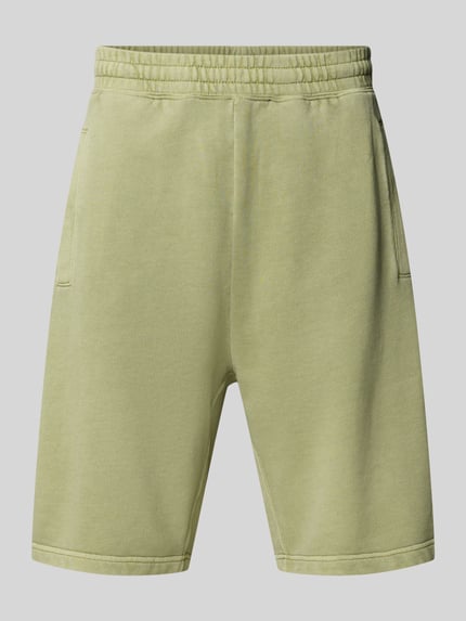Produktfoto, Sweatshorts mit Eingrifftaschen Modell 'Nelson' von Carhartt Work In Progress in hellem Grün aus Reine Baumwolle im Relaxed-Fit, sichtbarer Elastischer Bund, Bundweite bei Größe M: 42 cm, Innenbeinlänge bei Größe M: 24 cm, glatte Textur
