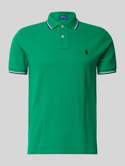 Produktfoto, Slim Fit Poloshirt aus reiner Baumwolle von Polo Ralph Lauren, Optik: Unifarben, Regular-Fit, Logo-Stitching, Kontraststreifen, Polokragen, Kurzarm, Ärmelabschluss: Gerippt, Rumpfabschluss: mit Seitenschlitzen, Materialverarbeitung: Piqué, Material: Reine Baumwolle, grüne Farbe, glatte Struktur.