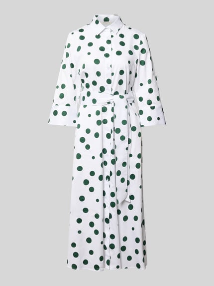Produktfoto, Hemdblusenkleid aus reiner bawełna Modell 'Alina' von Christian Berg Woman, taliowany krój, kołnierzyk koszulowy, rękaw o dł. 3/4, listwa guzikowa, tasiemka w talii, białe tło z zielonym wzorem w grochy, długość tyłu w rozmiarze 36: 121 cm, szerokość w rozmiarze 36: 46 cm, długość rękawów w rozmiarze 36: 48 cm