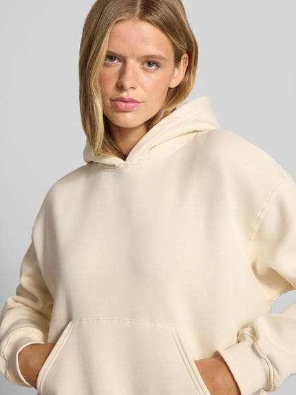 Gina Tricot Bluza z kapturem o kroju relaxed fit z mieszanki bawełny model 'Iconic' Jasnożółty 3