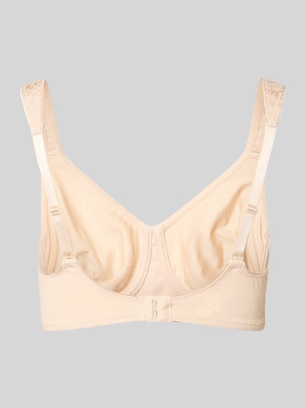 Frauenmodel trägt BH mit Hakenverschluss von Triumph aus Material-Mix mit Stretch-Anteil, körpernaher Schnitt, Verstellbare Träger, Ganzkörperansicht Rückansicht.