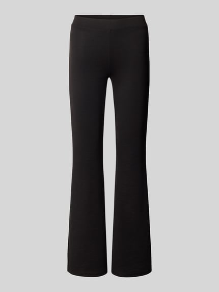 krój slim fit Wąskie spodnie z elastycznym pasem model 'FEVER' Shop The Look MANNEQUINE