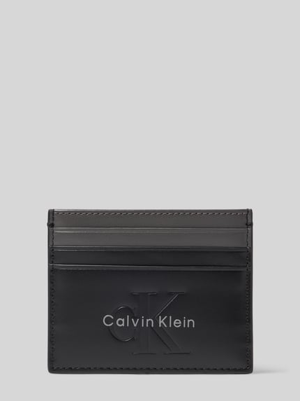 Produktfoto, Kartenhalter aus echtem Rindsleder von Calvin Klein in Schwarz, rechteckig, glatte Oberfläche, mehrere Kartenfächer, unifarben