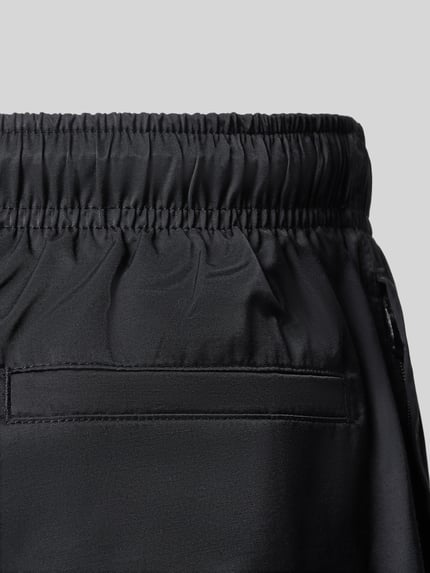 Produktfoto, Badehose mit elastischem Bund und Tunnelzug von MCNEAL in Schwarz aus Baumwoll-Mix, Regular-Fit, glatte Textur