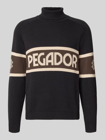 Produktfoto, Strickpullover mit Rollkragen van Pegador in zwart met beige strepen, katoenmix, regular fit, geribde randen, labelprint.