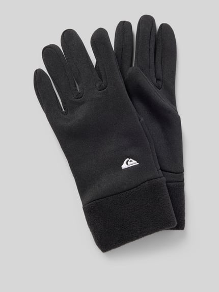 Produktfoto, czarne rękawiczki z label-stitching model 'HOTTAWA JR' od Quiksilver, dziecięce rękawiczki z polaru, widoczna faktura tkaniny.