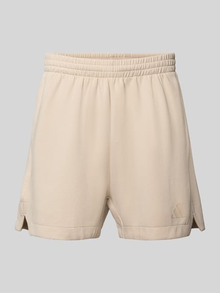 Produktfoto, Regular Fit Sweatshorts mit Modal und Baumwoll-Anteil von adidas Sportswear, Optik: Unifarben, Logo-Detail, elastischer Bundabschluss mit Tunnelzug, seitliche Eingrifftaschen, Material-Mix mit Modal und Baumwoll-Anteil, sandfarbene Oberfläche mit weicher Textur
