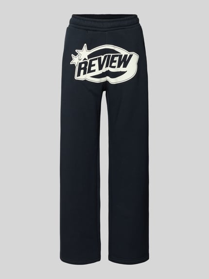 Produktfoto, schwarze Straight Leg Sweatpants mit Logo und elastischem Bund von Review aus Baumwoll-Mix, glatte Textur, gerade Form