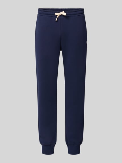 Produktfoto, Slim Fit Sweatpants aus Baumwoll-Mix von REVIEW in Dunkelblau mit elastischem Bund und Taschen, sportliche Optik