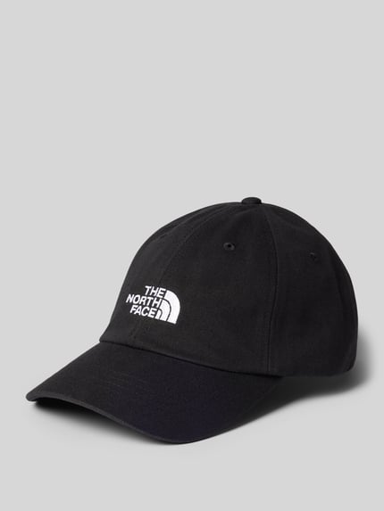 Produktfoto, schwarze Base Cap aus Baumwoll-Mix Modell 'Norm' von The North Face mit weißem Logo-Stitching und Strapback Verschluss.