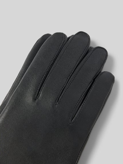 Produktfoto, schwarze glatte Handschuhe aus echtem Leder mit Label-Detail, unifarbenes Design, Handschuhe aus echtem Leder mit Label-Detail von Roeckl