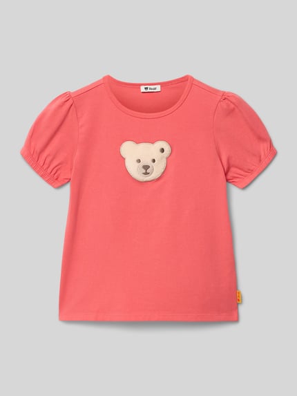 Produktfoto, T-Shirt mit Motiv-Stitching und Rundhalsausschnitt von Steiff, Kinder T-Shirt aus Baumwoll-Mix mit Stretch-Anteil, Gerader-Schnitt, Rundhalsausschnitt, Motiv-Stitching mit Label-Detail, elastische Ärmelabschlüsse, Rückenlänge bei Größe 116: 44 cm, in Rosa, glatte Textur, dezente Details.