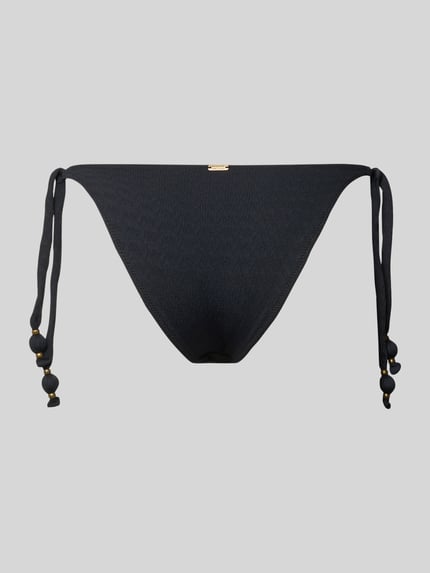 Produktfoto, Bikini-Slip mit Label-Detail Modell 'MASSA' von Banana Moon, schwarzer Material-Mix mit Stretch-Anteil, körpernaher Schnitt