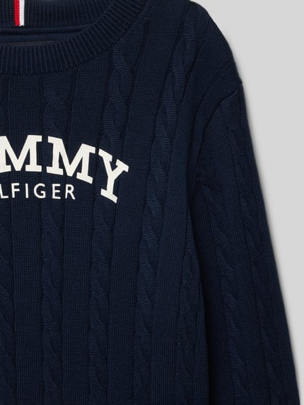 Productfoto, Regular Fit Pullover uit pure katoen van Tommy Hilfiger Teens, effen donkerblauw, kabelpatroon, labelprint, ronde hals, gebreide structuur