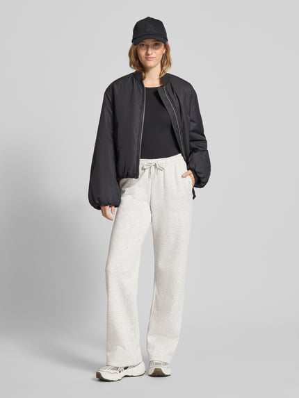 Gina Tricot Spodnie dresowe o kroju straight fit z tunelem Jasnoszary melanż 1