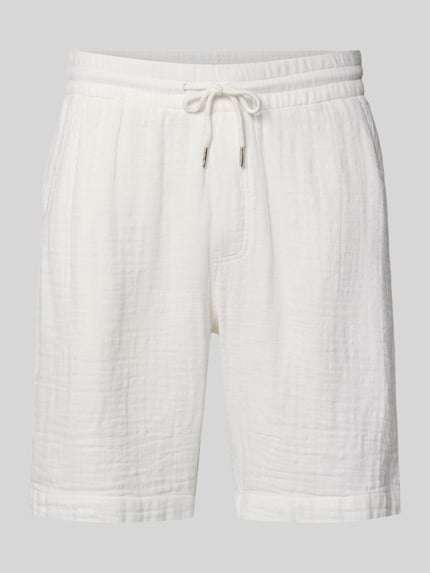 Produktfoto, Shorts mit Eingrifftaschen und elastischem Bund von Lindbergh in Weiß, Reine Baumwolle, Loose-Fit, sichtbare Struktur, Kordelzug, französische Eingrifftaschen, Gesäßleistentaschen, Bundweite bei Größe M 43 cm, Innenbeinlänge bei Größe M 22 cm.