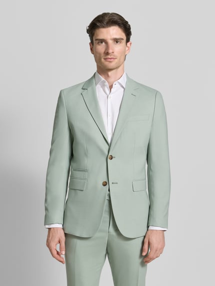 Männermodel trägt Slim Fit Anzugsakko mit Woll-Anteil Modell 'SLIM-NEIL' von SELECTED HOMME, Optik: Unifarben, Ganzkörperansicht von vorne.