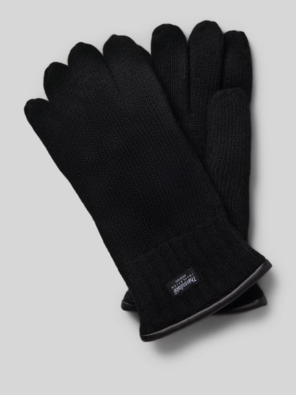 Produktfoto, Handschuhe aus reiner Wolle von EEM in Unifarben, Strick-Optik, eingefasste Abschlüsse, schwarze Farbe, weiche Textur