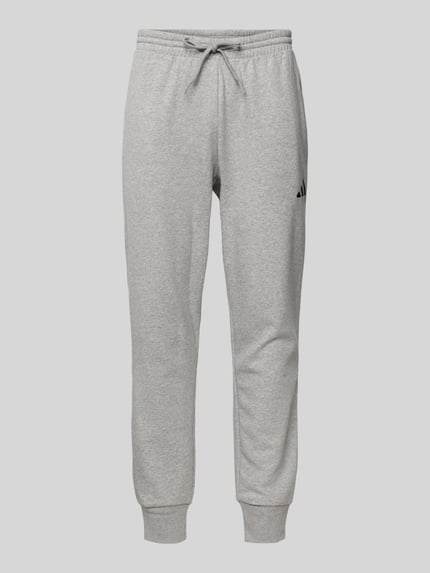 Spodnie dresowe o kroju relaxed fit z wyhaftowanym logo Shop The Look MANNEQUINE