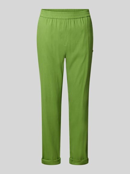 Produktfoto, Stoffhose aus Leinen-Mix mit französischen Eingrifftaschen von Marc Cain in leuchtendem Grün, gerader Schnitt, elastischer Bund, Aufschlag am Saum, integrierte Gesäßtaschen und Viskose-Anteil, glatte Textur