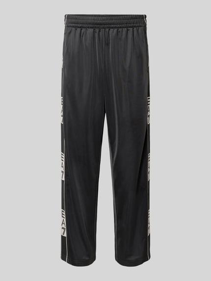 Spodnie treningowe z bocznymi listwami zapinanymi na guziki Shop The Look MANNEQUINE