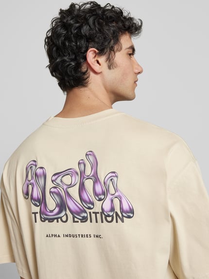 Alpha Industries T-shirt z nadrukiem z logo model ‘Studio Edition’ Złamany biały 3
