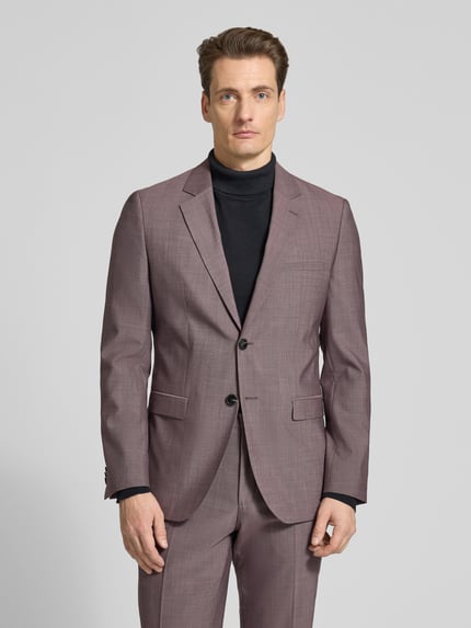 Männermodel trägt Extra Slim Fit Anzugsakko aus Schurwoll-Mix Modell 'ARTI253X' von HUGO, look effen, ganzkörperansicht von vorne.