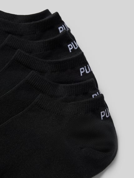 Produktfoto, schwarze Socken aus Baumwoll-Mix im 6er-Pack von PUMA, feine Struktur, weißes PUMA-Logo, Herren Socken von PUMA.