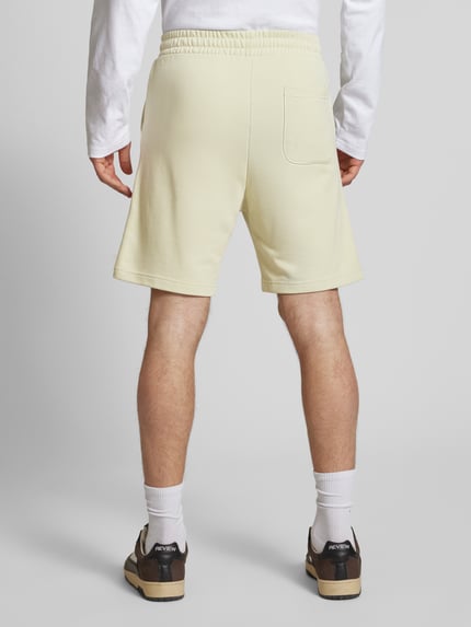 JACK & JONES Szorty z dzianiny dresowej z nadrukiem z logo model ‘KANE’ Miętowy 5