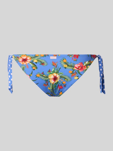 Produktfoto, figi bikini 'DOLCEVITA BOA' od Banana Moon, mieszanka materiałów z dodatkiem streczu, dopasowany krój, wzór na całej powierzchni, boczne wiązanie, niebieski kolor z kolorowym nadrukiem kwiatowym i białymi kropkami