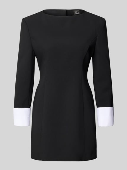 Produktfoto, zwart-wit Minikleid met ronde halslijn, getailleerde snit, model 'TALISSO' van Marella, achterrits, gladde textuur.