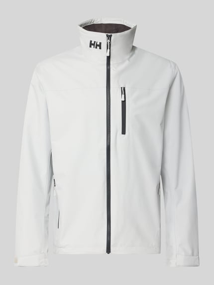 Produktfoto, Regular Fit Jacke mit Stehkragen Modell 'Crew' von Helly Hansen in Weiß mit Logo-Print, Reißverschlusstaschen und Napoleontasche.