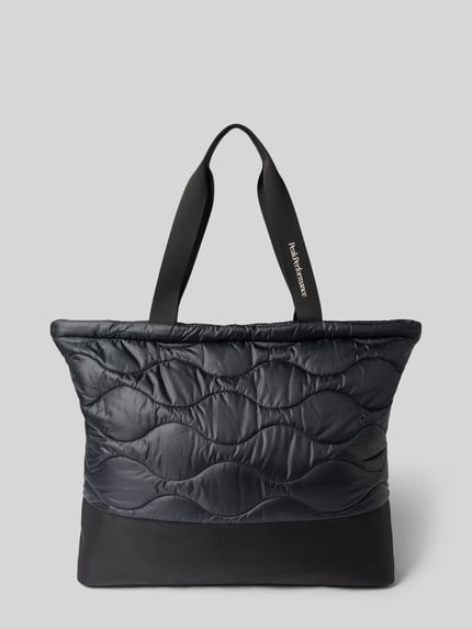 Produktfoto, Tote Bag mit Reißverschluss Modell 'HELIUM' von Peak Performance, schwarzer, gesteppter Stoff, Logo-Print, lange Tragegriffe, Damenaccessoire