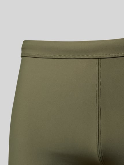 Produktfoto, 'Slim Fit Bade-Trunks mit Logo-Detail' von Calvin Klein Underwear, mieszanka elastycznych materiałów, krój slim fit, detal z logo, elastyczny pas, jednolity kolor oliwkowy, gładka tekstura