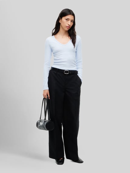 Tommy Jeans bluzka z długim rękawem o kroju slim fit z detalem z logo Jasnoniebieski 1