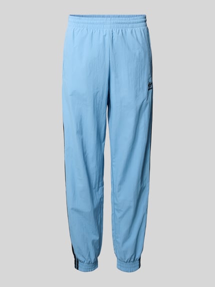 adidas Originals Spodnie dresowe o kroju regular fit z wyhaftowanym logo model ‘FIREBIRD’ Szaroniebieski 2