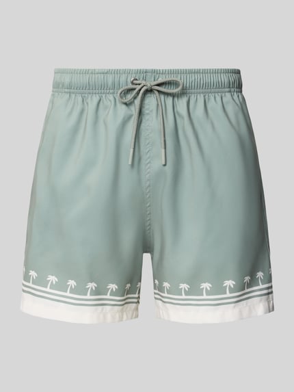Produktfoto, Badehose mit elastischem Bund Modell 'Shore Palm' von BOARDIES in Grün mit Palmenmuster, Regular Fit, glatte Textur