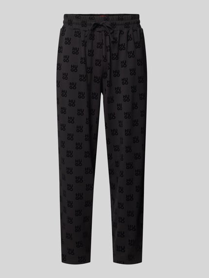 Produktfoto, schwarze Regular Fit Sweathose aus Baumwoll-Mix von HUGO mit Allover-Logo, lockere Passform, weiche Textur, Herren Sweathose