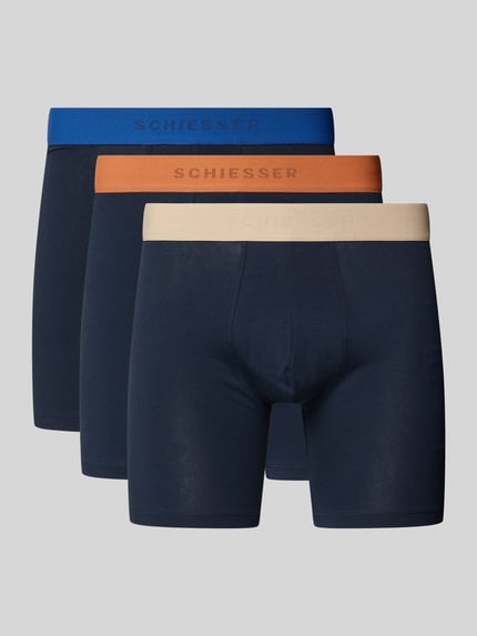 Produktfoto, Boxer Brief aus Single Jersey im 3er-Pack von SCHIESSER in Dunkelblau, Kontrastbund in Blau, Orange und Beige, Baumwoll-Elasthan-Mix, körpernahe Passform, sichtbares Logo, glatte Textur