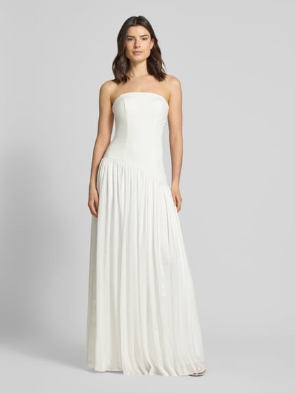 Vrouwenmodel draagt Slim Fit Brautkleid in plooien-look van Unique, strapless, licht a-lijn, met onderrok, voorkant hele lichaam.