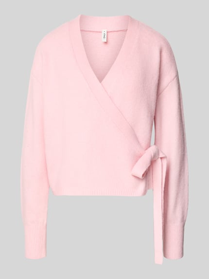 Produktfoto, Regular Fit Cardigan mit Woll-Anteil Modell 'KIRA' von ONLY in zartem Rosa, Optik: Unifarben, Melange, Strickoptik, Wickeloptik, Taillengürtel, Crew Neck, V-Ausschnitt, Langarm, gerippte Abschlüsse, Materialverarbeitung: Strick, Material-Mix mit Woll-Anteil.
