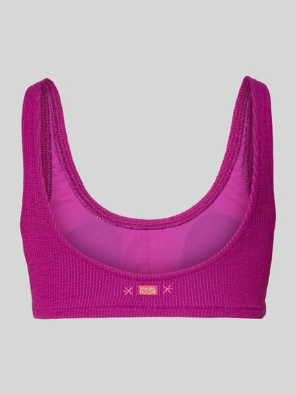 Produktfoto, Bikini-Oberteil mit Label-Detail Modell 'JUSTIN' von Banana Moon, fuchsia, feine Strickstruktur, Material-Mix mit Stretch-Anteil, dopasowany krój.