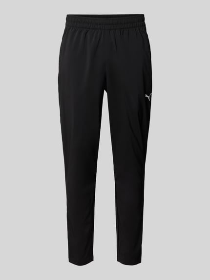 tapered fit trainingsbroek met elastische band model 'TAD ESSENTIALS' Shop The Look MANNEQUINE