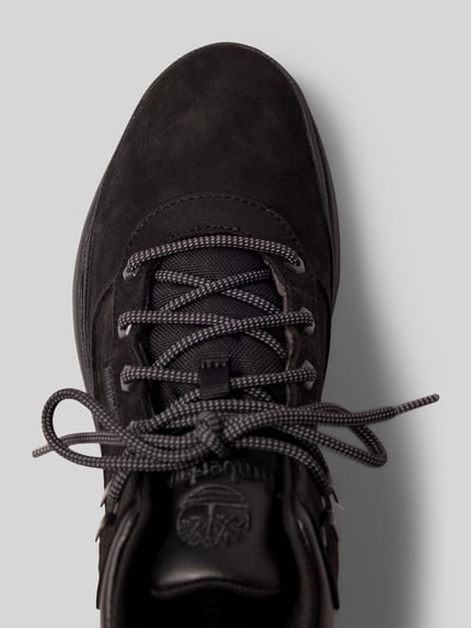 Produktfoto, Sneaker aus echtem Leder Modell 'Trekker' von Timberland in zwart leermix met grijze veters, logodetail, hakhoogte maat 44: 4 cm, schachthoogte 8 cm, schachtbreedte 10 cm