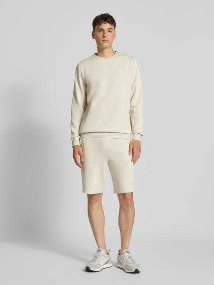 PUMA Performance Sweatshirt mit Label-Stitching Offwhite 1